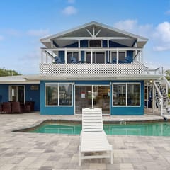 Waterfront home with private pool deck and patio 1/2 mile to the beach