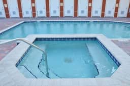 Beautiful condo minutes form beach with WiFi AC and pool One dog OK