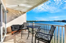 Waterfront condo with shared heated pool and splendid views Dogs ok - Image 2