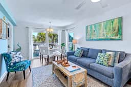 Contemporary gem on the Gulf Coast with balcony and WD walk to beach and shops