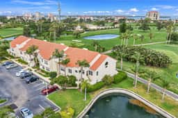 Golf Course View front condo with pool and private beach access snowbird friendly