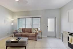 Enchanting condo with full kitchen enclosed yard and washer dryer