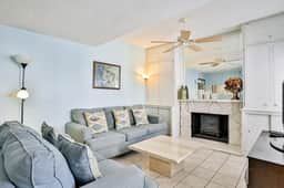 Water view condo with balcony heated pool and WD walk to beach