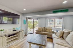Gulf side condo with heated pool hot tub central AC and WD snowbird friendly