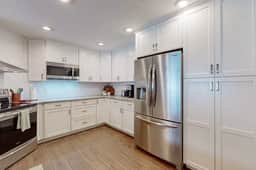 Fully renovated family friendly with covered patio hot tub central location