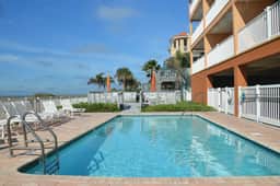 Corner waterfront condo with pool Gulf views and easy beach access