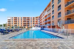 Waterfront condo with pool hot tub tennis and beach access