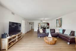 Modern cottage with peek a boo side Gulf view and beachfront heated pool and spa