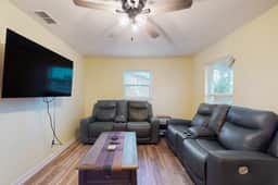 Cozy home with screened lanai foosball and fenced yard