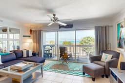 Gulf view and stunning sunsets family friendly steps from beaches WD and WIFI