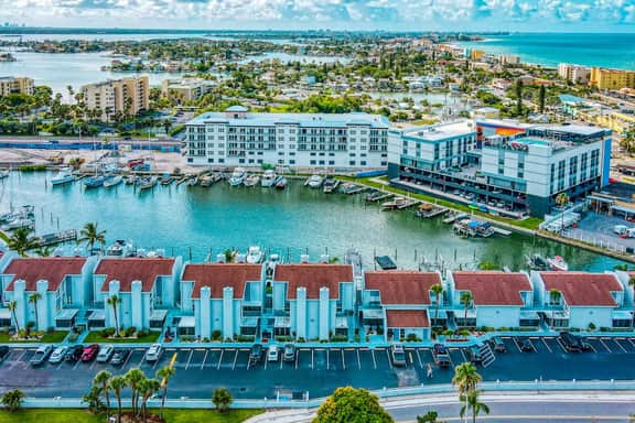 Water view condo with balcony grill heated pool hot tub and sauna walk to beach