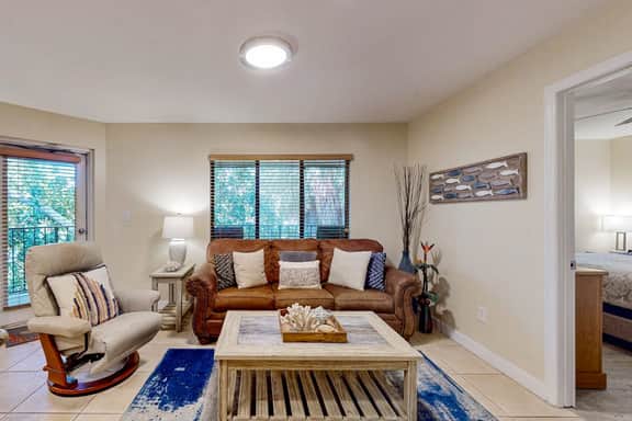 Top floor Condo with on site pool hot tub grills gym and private balcony