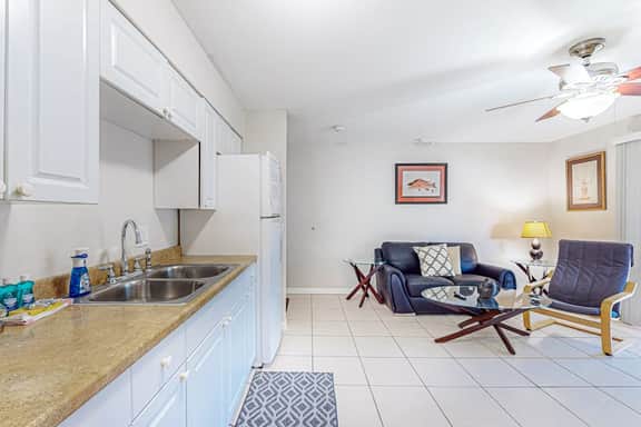 Centrally located condo with heated pool balcony washer dryer and central AC