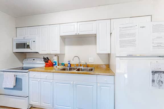 Centrally located condo with heated pool balcony washer dryer and central AC