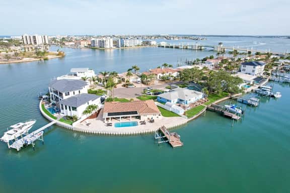 Chic waterfront retreat with private pool and outdoor kitchen near the beach - Image 2