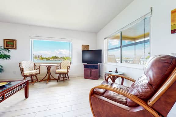 Bayfront 2nd floor condo in great location with water views dock WD balcony