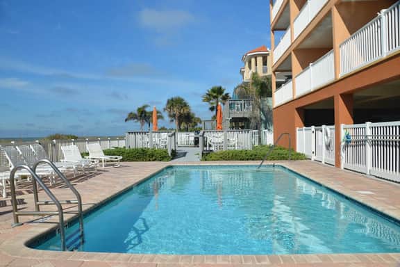 Corner waterfront condo with pool Gulf views and easy beach access