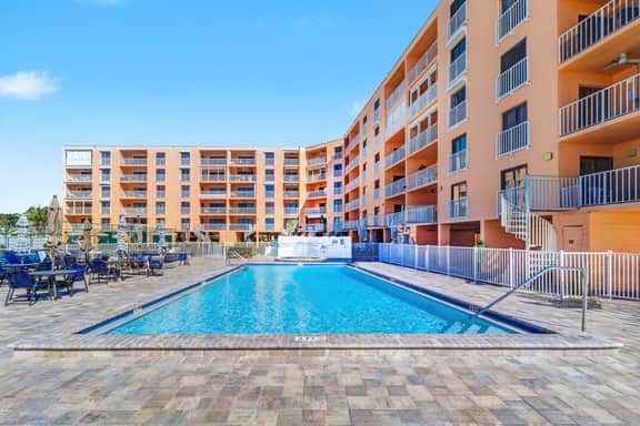 Waterfront condo with pool hot tub tennis and beach access