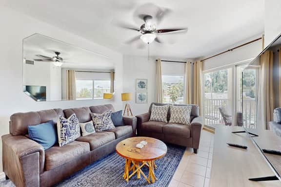 Second floor condo with beach access balcony pool hot tubs and ping pong - Image 2