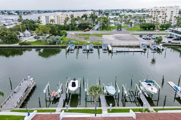 Snowbird friendly waterfront condo with WiFi hot tub heated pool and washer dryer