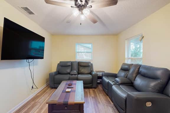 Cozy home with screened lanai foosball and fenced yard
