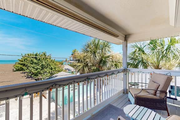 Gulf view and stunning sunsets family friendly steps from beaches WD and WIFI - Image 2
