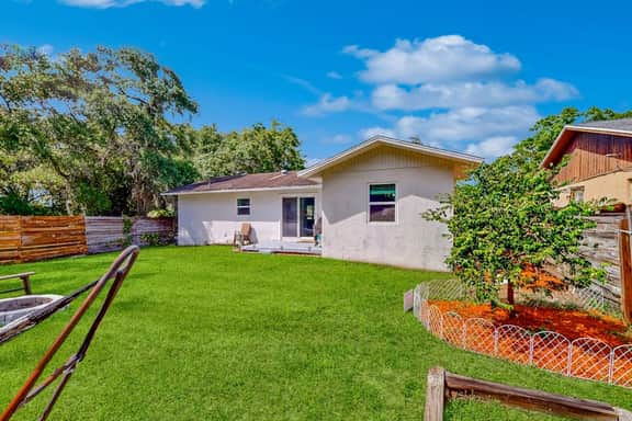 Dog friendly home with fenced yard firepit washer dryer and central AC