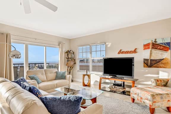 Top floor condo near the beach with pool hot tub washer dryer