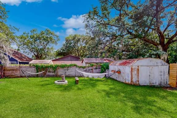 Dog friendly home with fenced yard firepit washer dryer and central AC