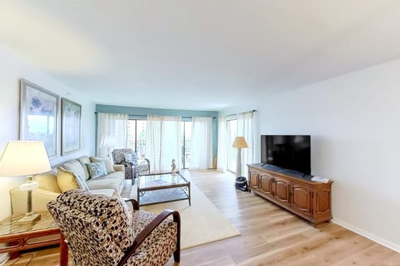 Coastal condo with beach and pool access balcony WD central air and water views - Image 1
