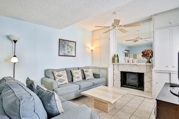 Water view condo with balcony heated pool and WD walk to beach - Image 1
