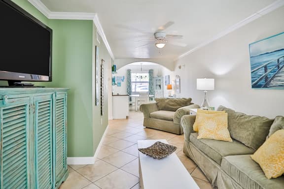 1st floor condo with private dock easy beach access heated pool and patio