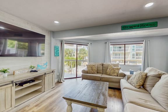 Gulf side condo with heated pool hot tub central AC and WD snowbird friendly - Image 1