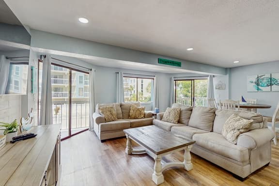 Gulf side condo with heated pool hot tub central AC and WD snowbird friendly