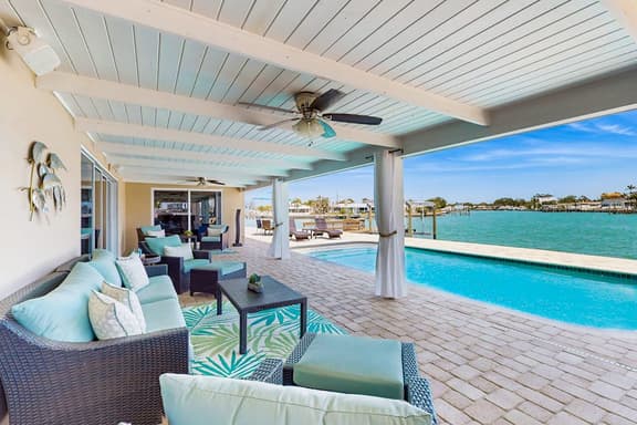 Chic waterfront retreat with private pool and outdoor kitchen near the beach - Image 1