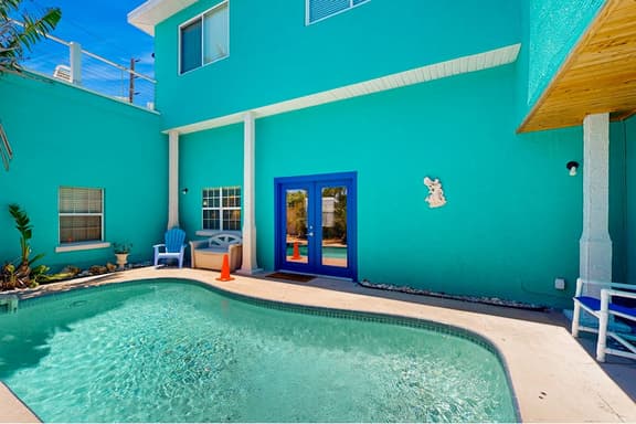 Treasure Island paradise with pool and Gulf view deck steps to Sunset Beach - Image 1