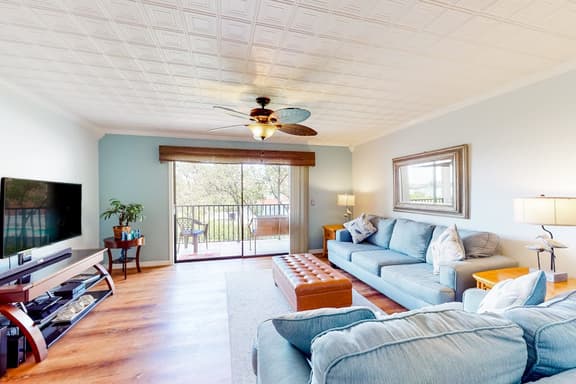 Beachfront condo with balconies grill AC and pool access steps from the sand - Image 1