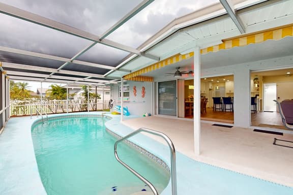 Canal front home with private pool dock grill canal views and WD - Image 1
