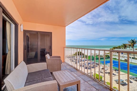 Waterfront condo with pool hot tub tennis and beach access - Image 1