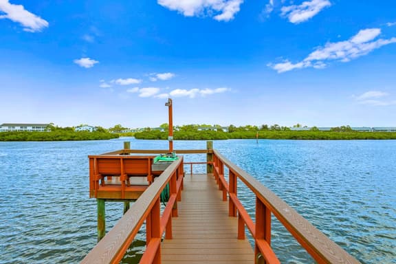 Renovated condo with on site pool beach access and modern charm