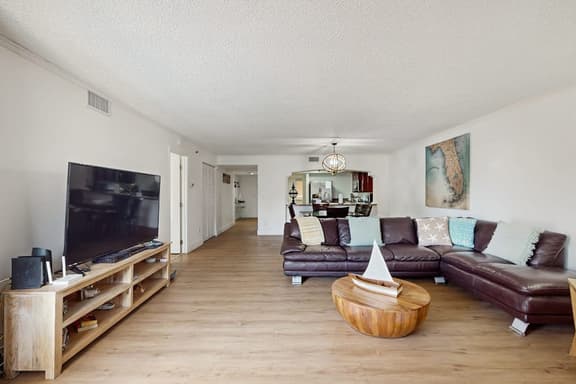 Modern cottage with peek a boo side Gulf view and beachfront heated pool and spa - Image 1