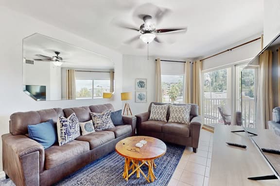 Second floor condo with beach access balcony pool hot tubs and ping pong