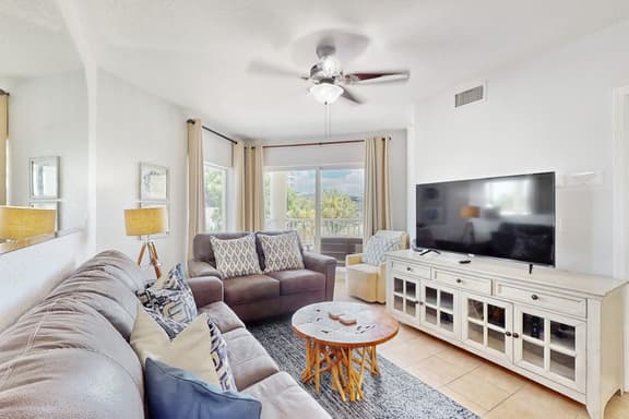 Second floor condo with beach access balcony pool hot tubs and ping pong - Image 1