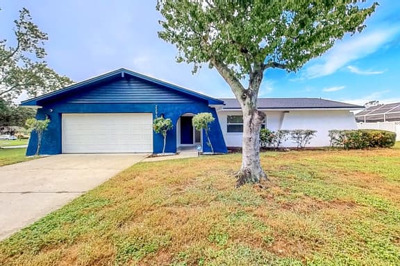Bright and open home with private pool screened lanai enclosed yard and WD - Image 1