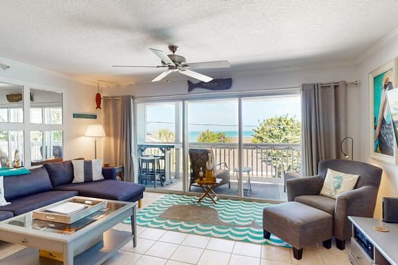 Gulf view and stunning sunsets family friendly steps from beaches WD and WIFI - Image 1